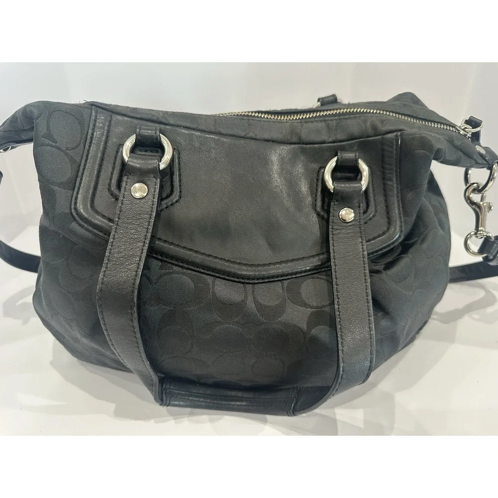 Coach black signature